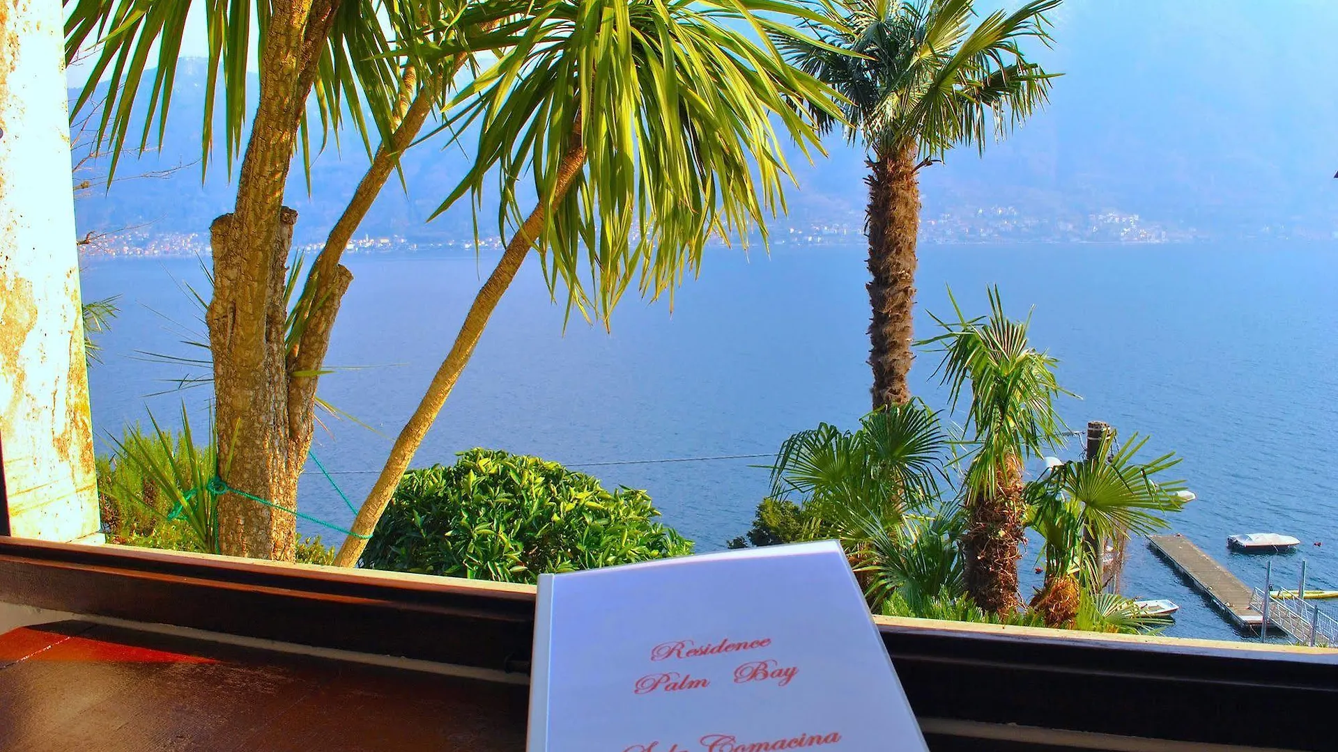 Palm Bay Garden Apartment Sala Comacina Italy